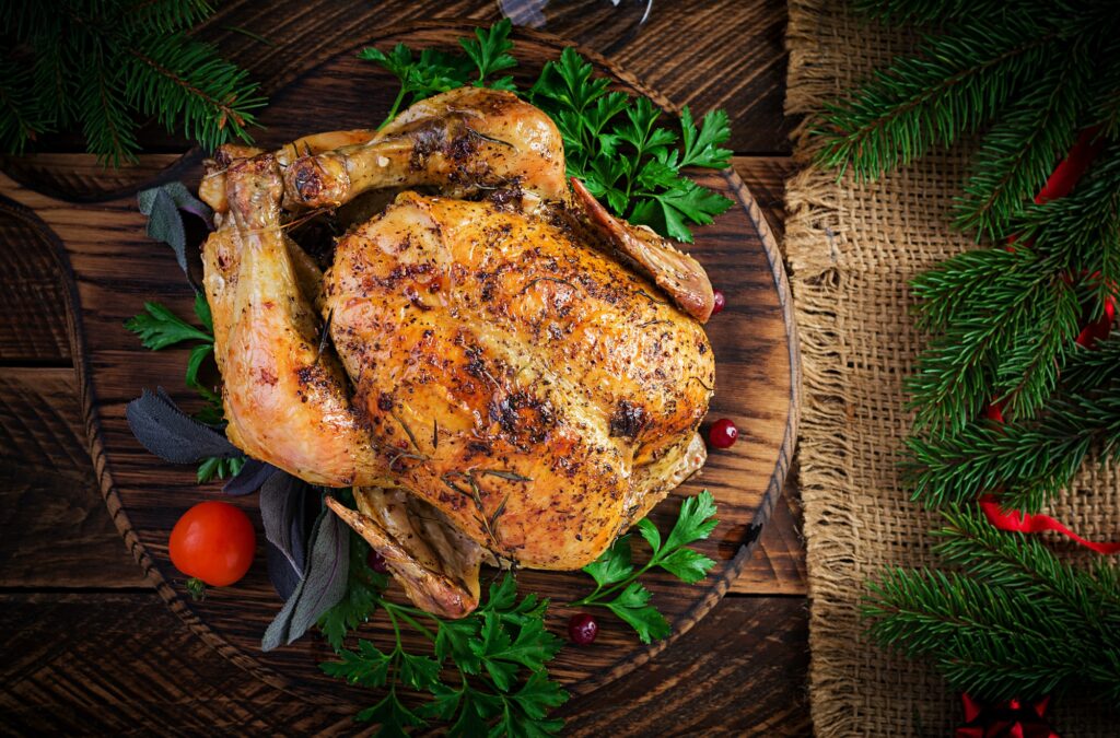 Baked turkey or chicken. The Christmas table is served with a turkey