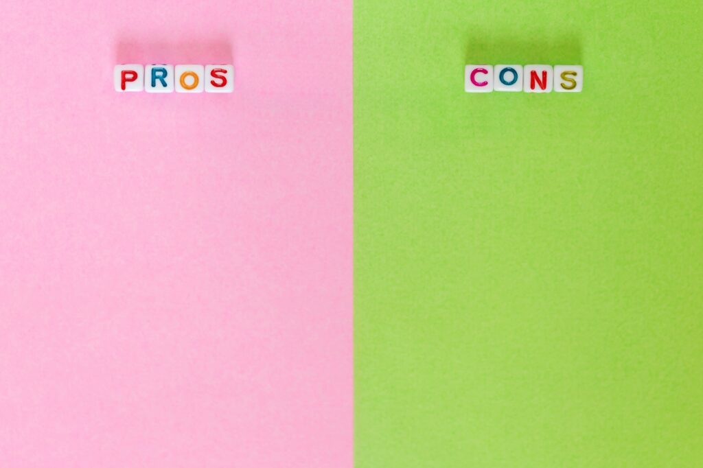 Pros and Cons, blank paper with different colours to write positives and negatives
