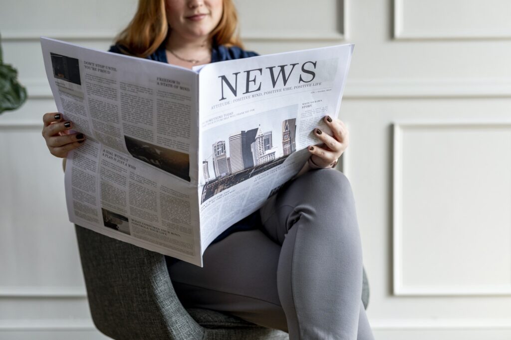 Businesswoman reading the news
