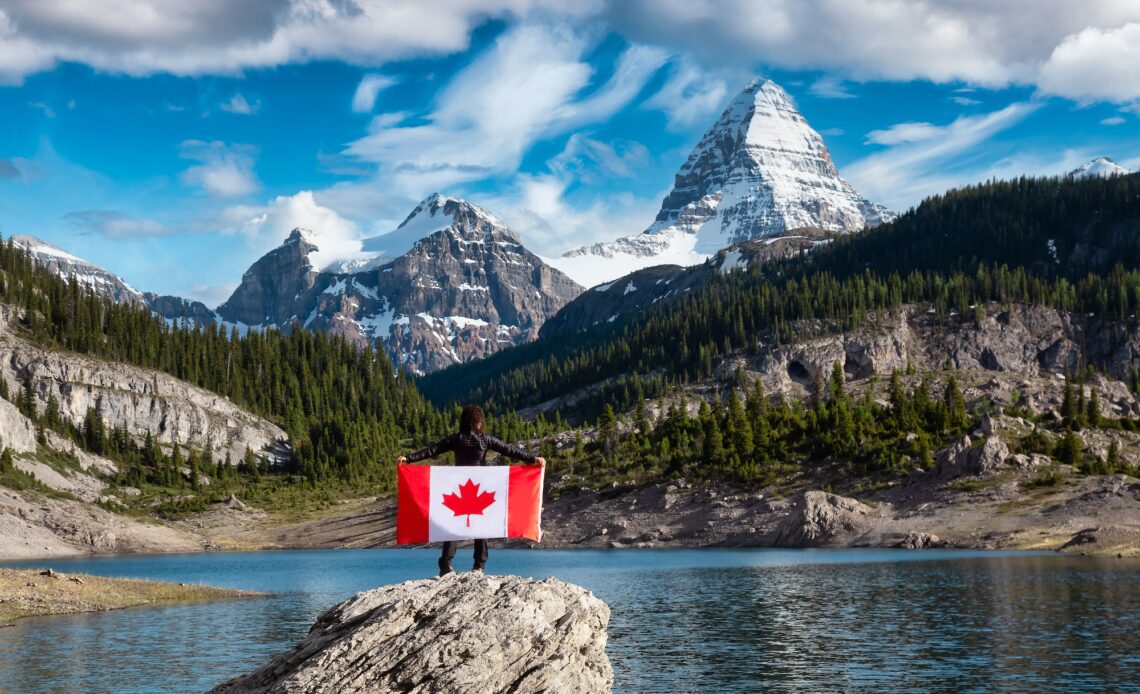 Girl Holding a Canadian National Flag