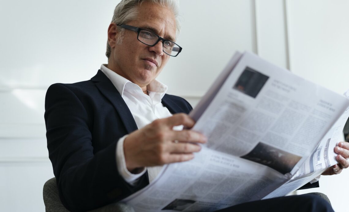 Businessman reading the news